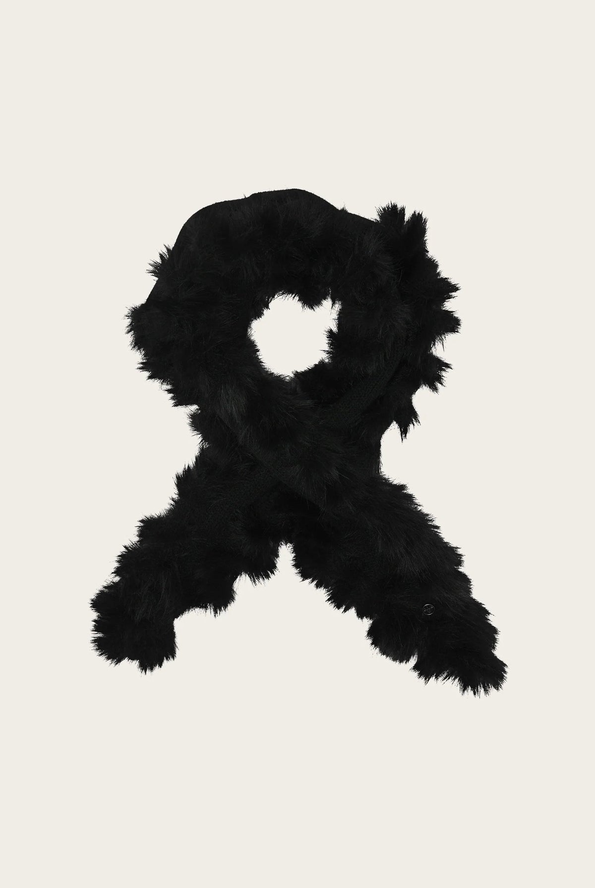A black faux fur scarf arranged in a loop shape on a solid light beige background.