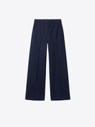 A pair of dark navy blue wide-leg trousers with a flat front and side pockets, displayed flat against a light gray background.